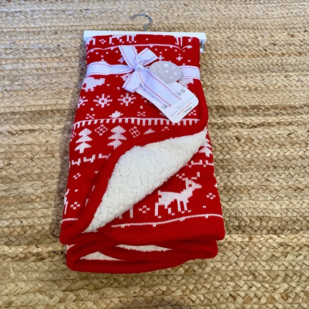 Red Holiday Blanket with White Reindeer Pattern kids
